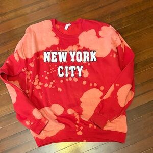 Very good UC.  Revelation red tie-dye NYC sweatshirt.